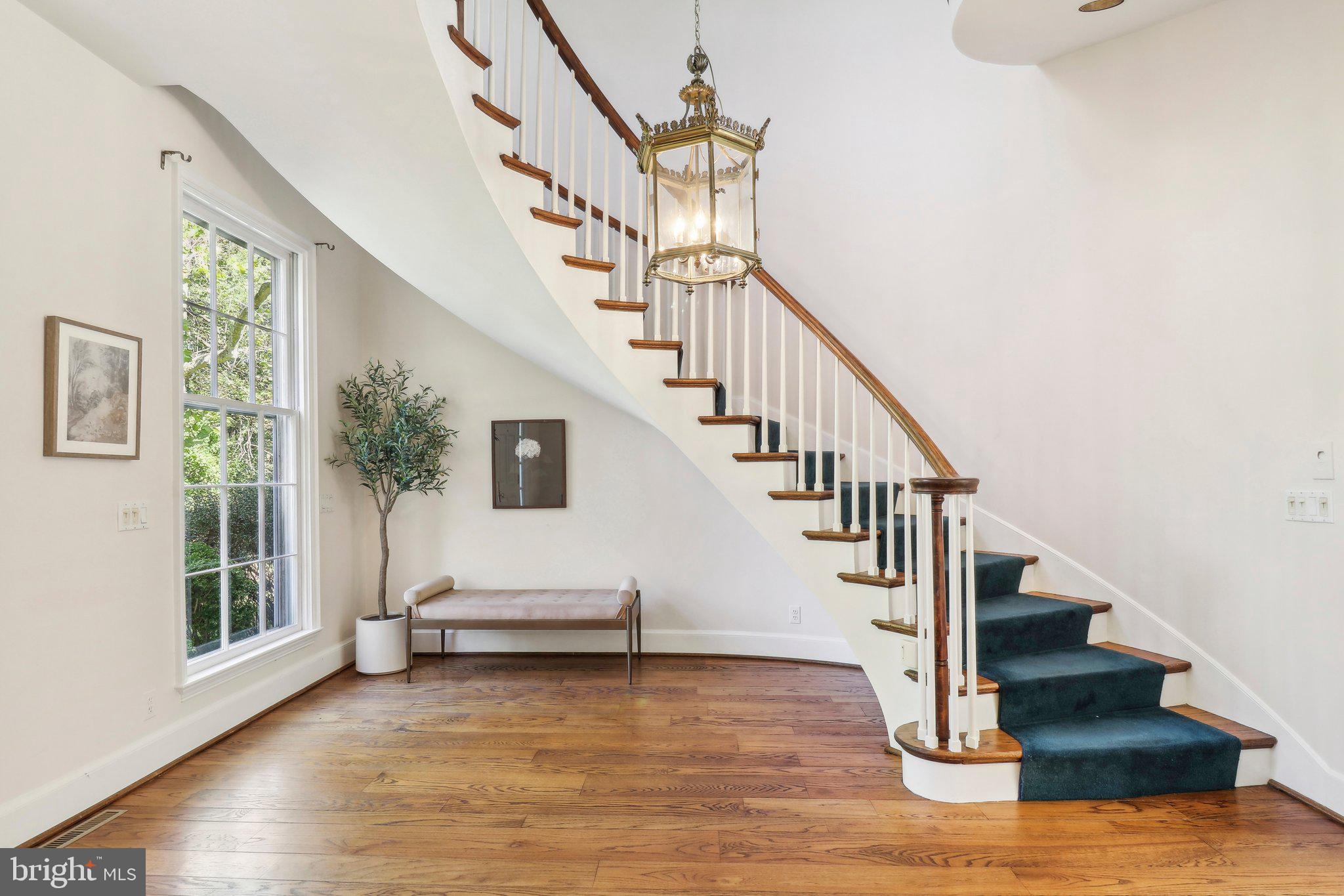 10650 Gunston Road Lorton, VA 22079 - Photo 32 of 73 a view of entryway and hall with wooden floor
