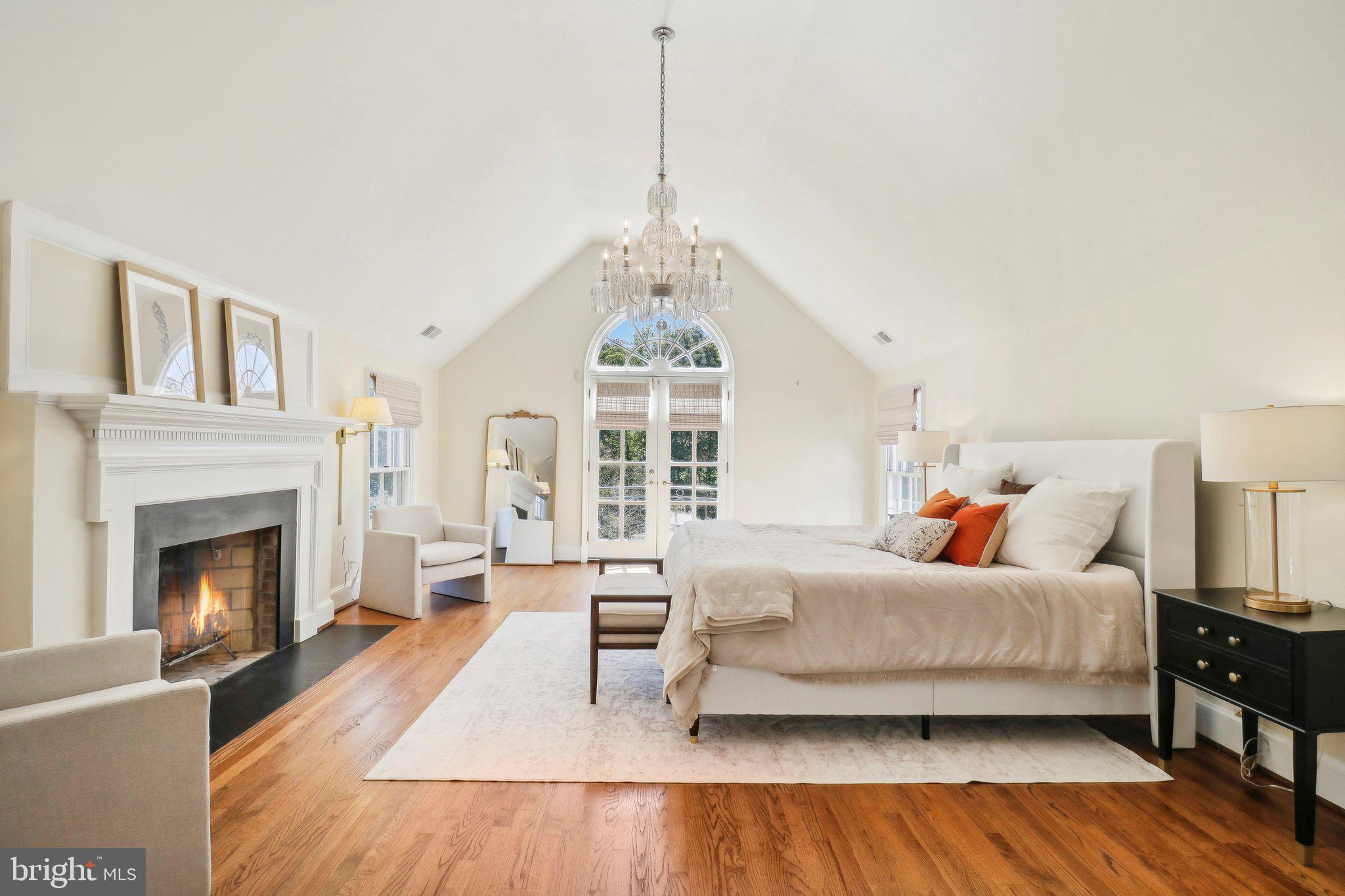 10650 Gunston Road Lorton, VA 22079 - Photo 38 of 73 a bedroom with a bed and a fireplace