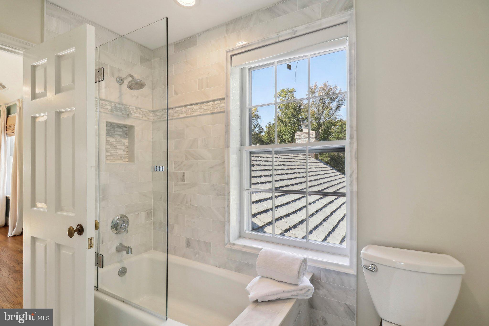 10650 Gunston Road Lorton, VA 22079 - Photo 48 of 73 a bathroom with a shower and a toilet