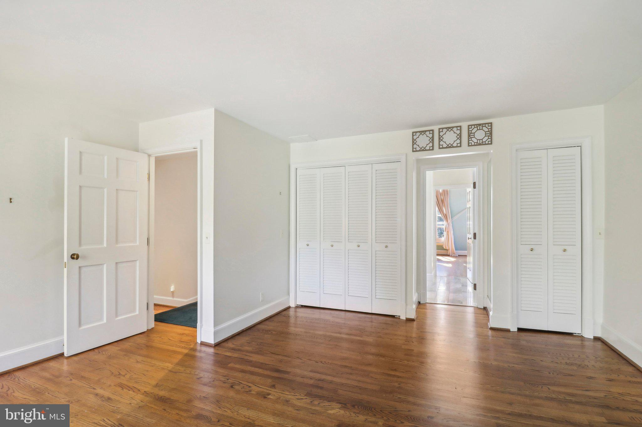 10650 Gunston Road Lorton, VA 22079 - Photo 51 of 73 a view of an empty room and wooden floor