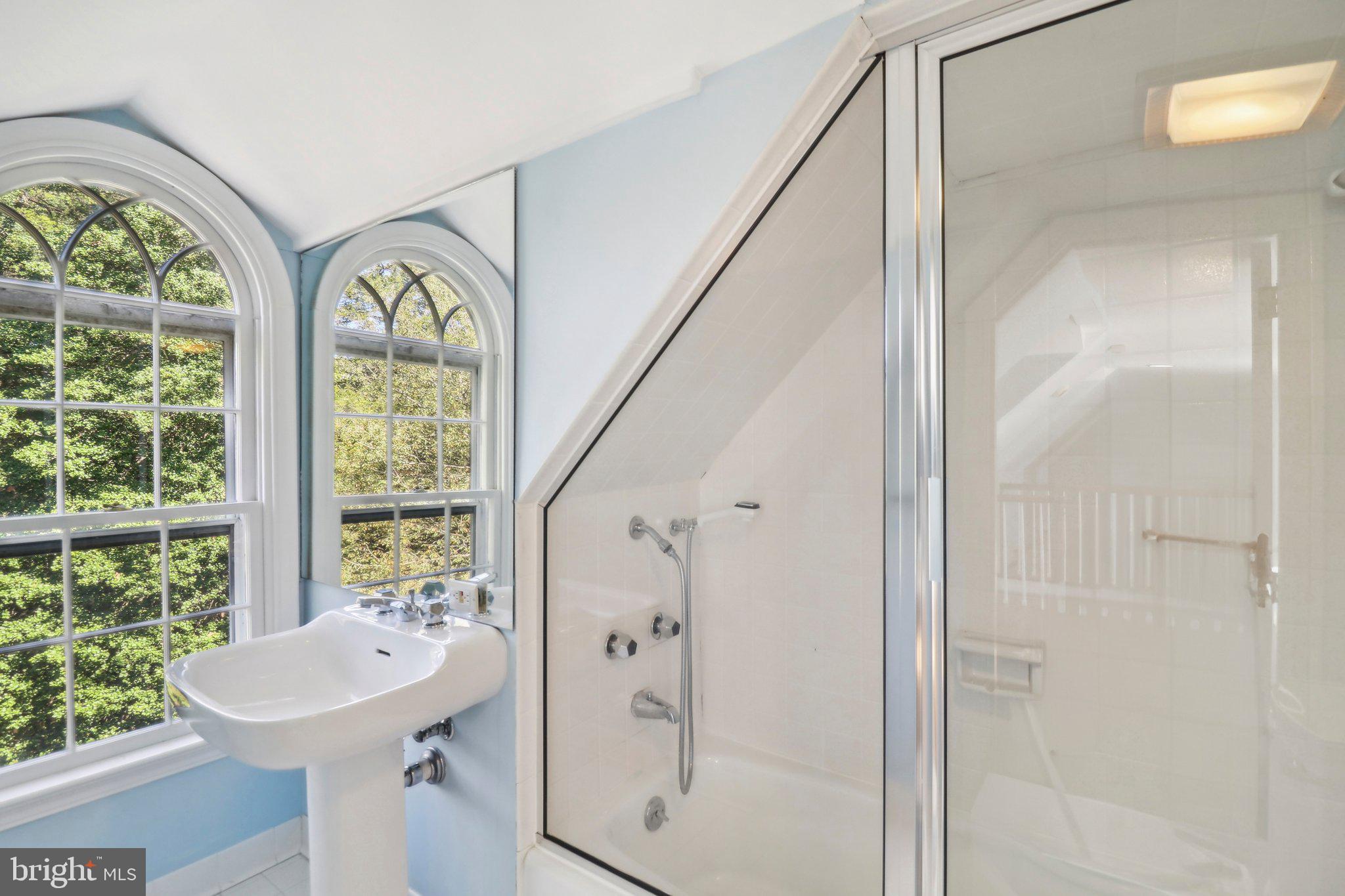 10650 Gunston Road Lorton, VA 22079 - Photo 56 of 73 a bathroom with a sink and a mirror