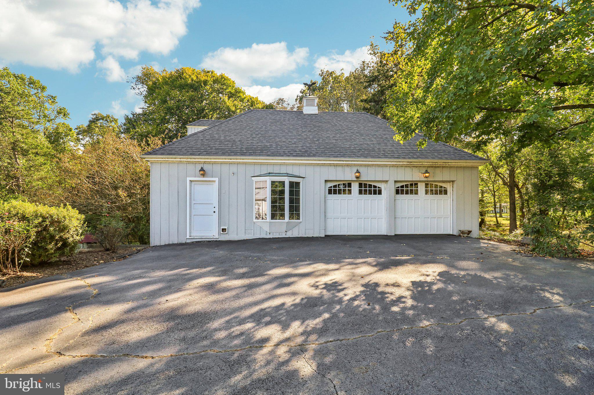 10650 Gunston Road Lorton, VA 22079 - Photo 65 of 73 a view of a house with a yard and large tree