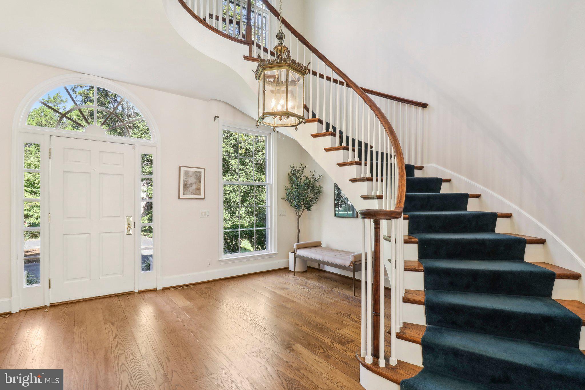 10650 Gunston Road Lorton, VA 22079 - Photo 9 of 73 Original Curved Floating Staircase in Foyer