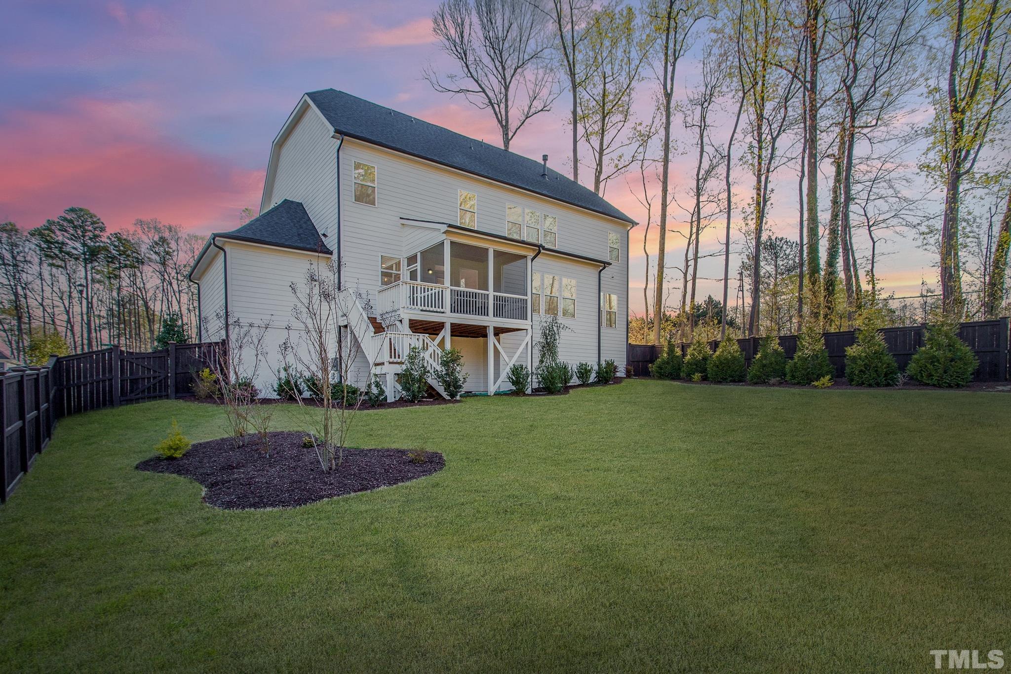5601 Norcrest Street Raleigh, NC 27612 - Photo 13 of 41 a view of a back yard of the house