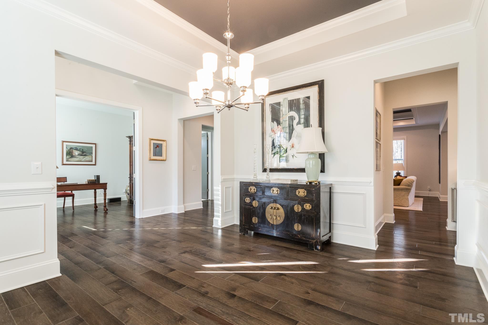5601 Norcrest Street Raleigh, NC 27612 - Photo 19 of 41 a view of a livingroom with furniture and wooden floor