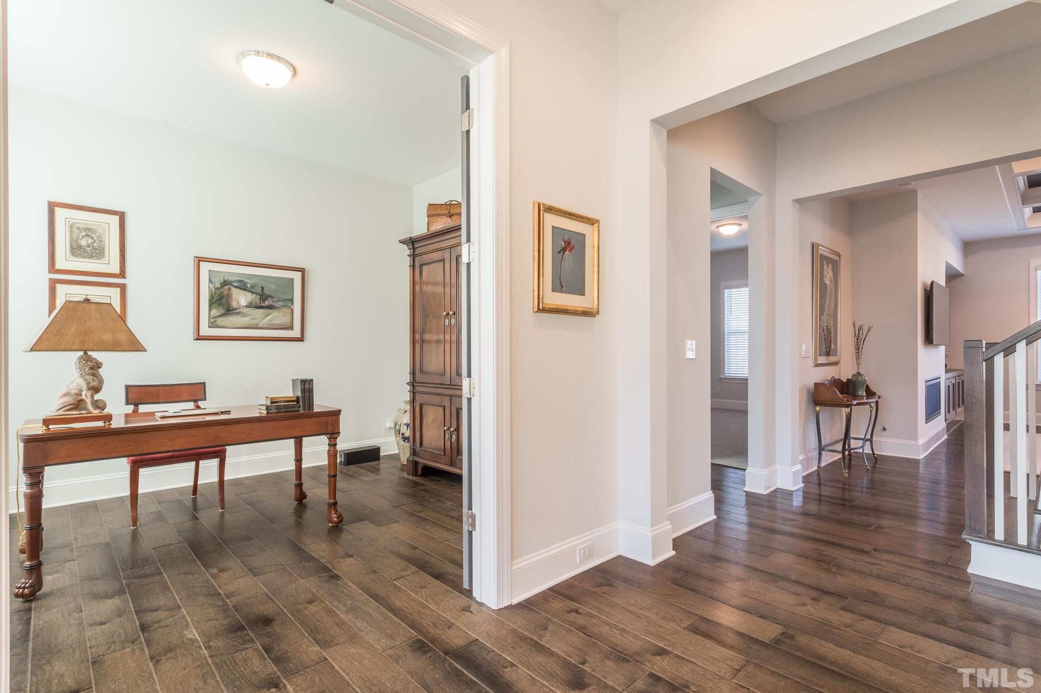 5601 Norcrest Street Raleigh, NC 27612 - Photo 21 of 41 a work room with furniture and wooden floor