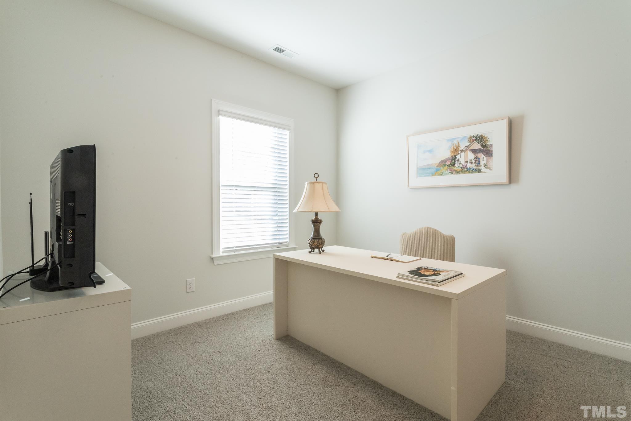 5601 Norcrest Street Raleigh, NC 27612 - Photo 29 of 41 a room that has a dresser in it