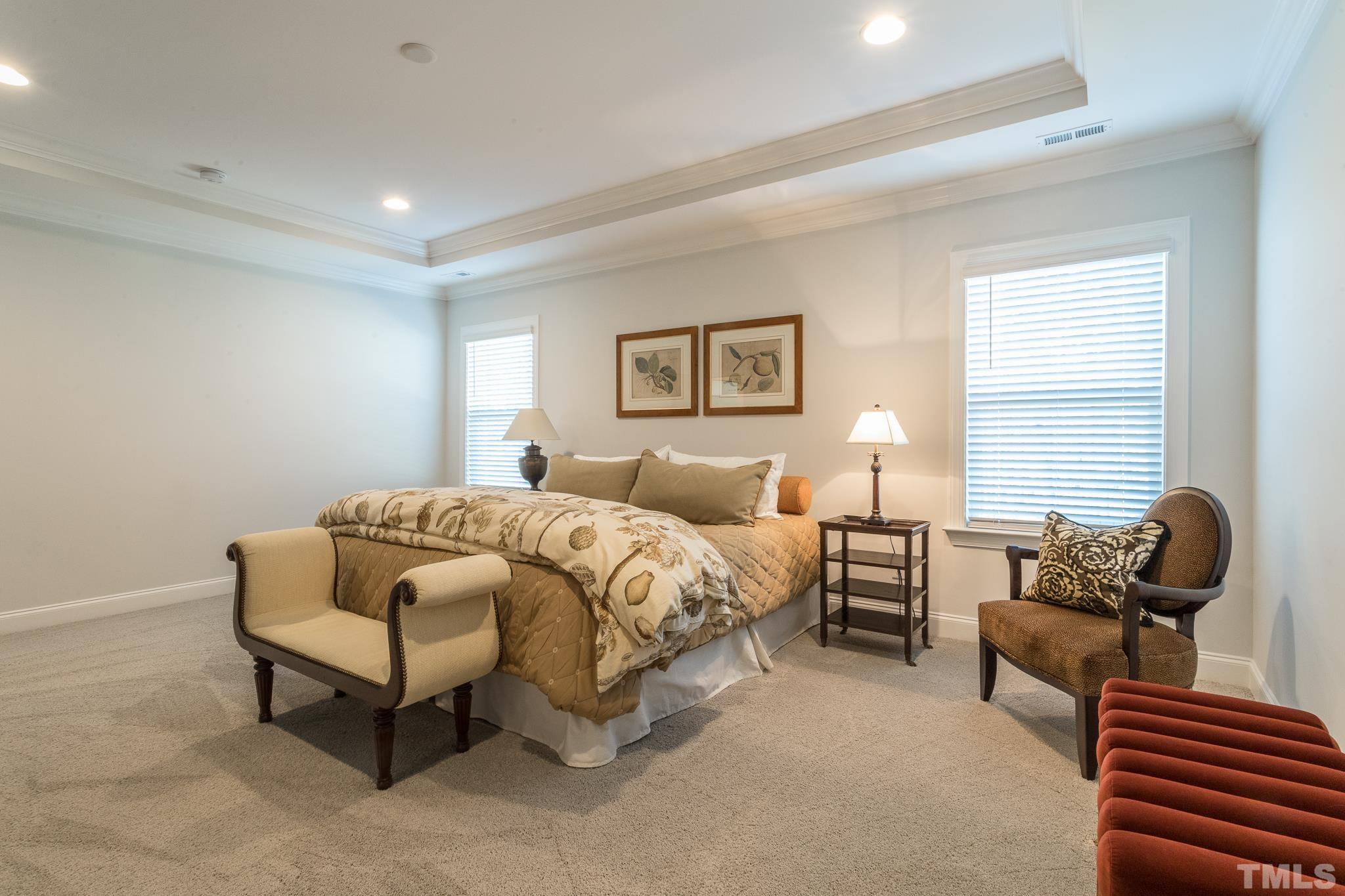 5601 Norcrest Street Raleigh, NC 27612 - Photo 35 of 41 a bedroom with furniture and a window