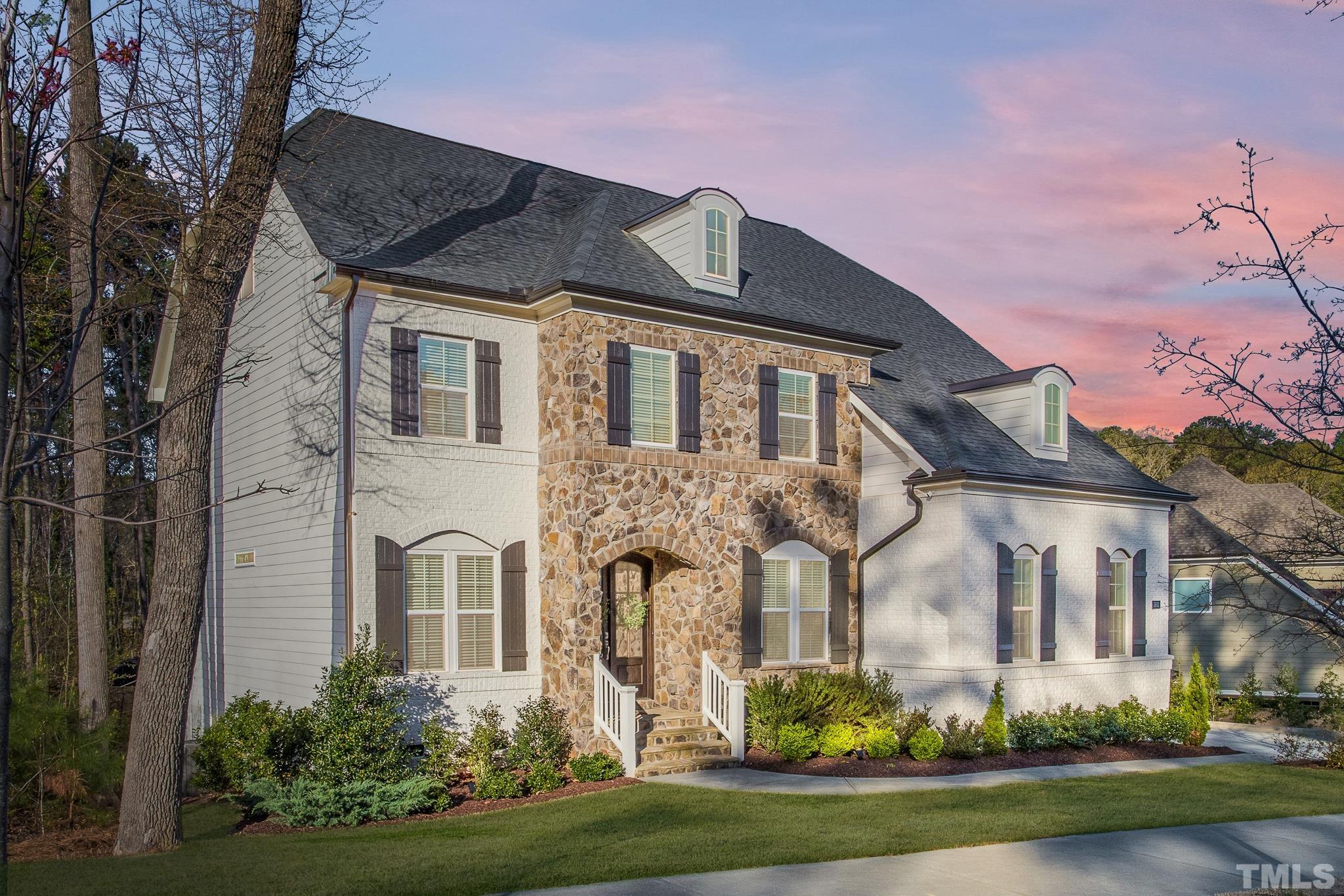 5601 Norcrest Street Raleigh, NC 27612 - Photo 40 of 41 front view of a house with a yard