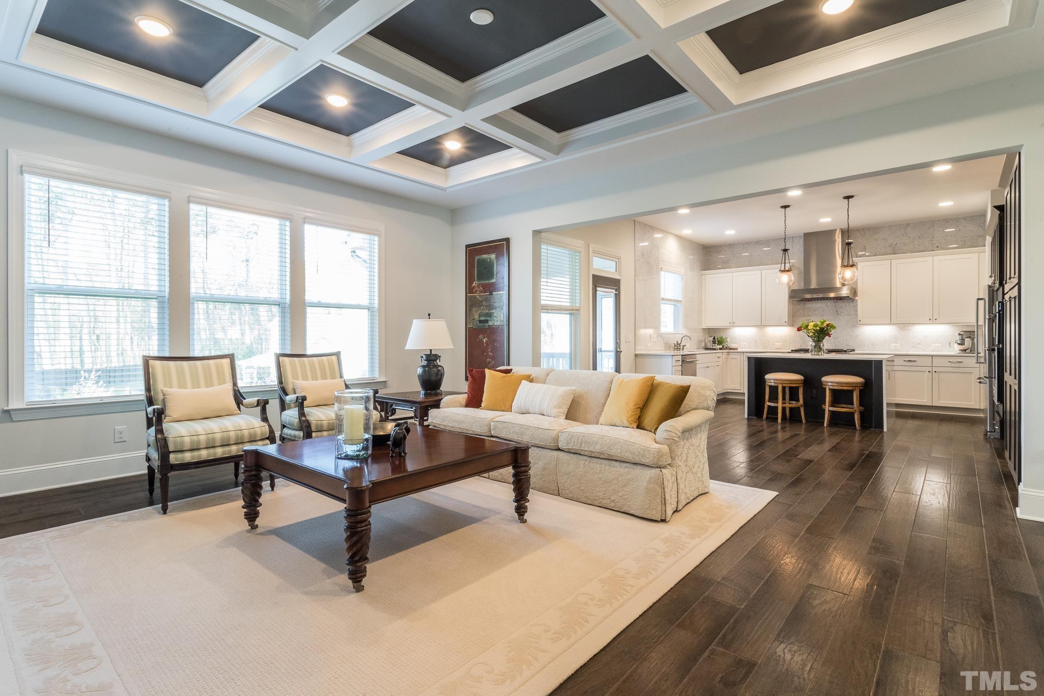 5601 Norcrest Street Raleigh, NC 27612 - Photo 7 of 41 a living room with furniture and wooden floor