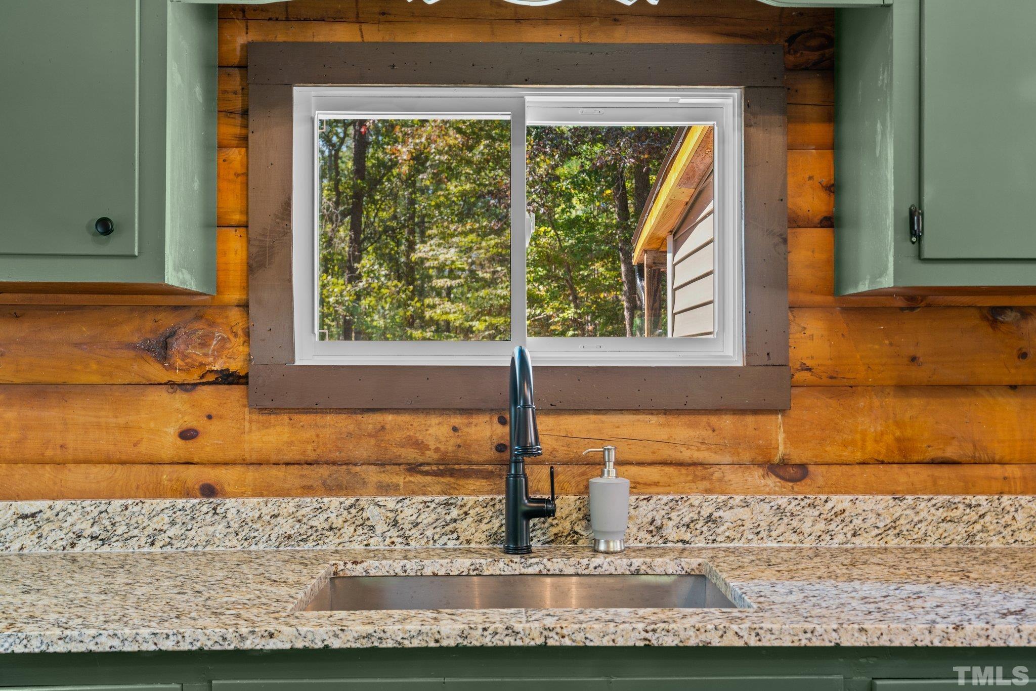2296 Nursery Road Lillington, NC 27546 - Photo 15 of 43 a view of a sink and a window