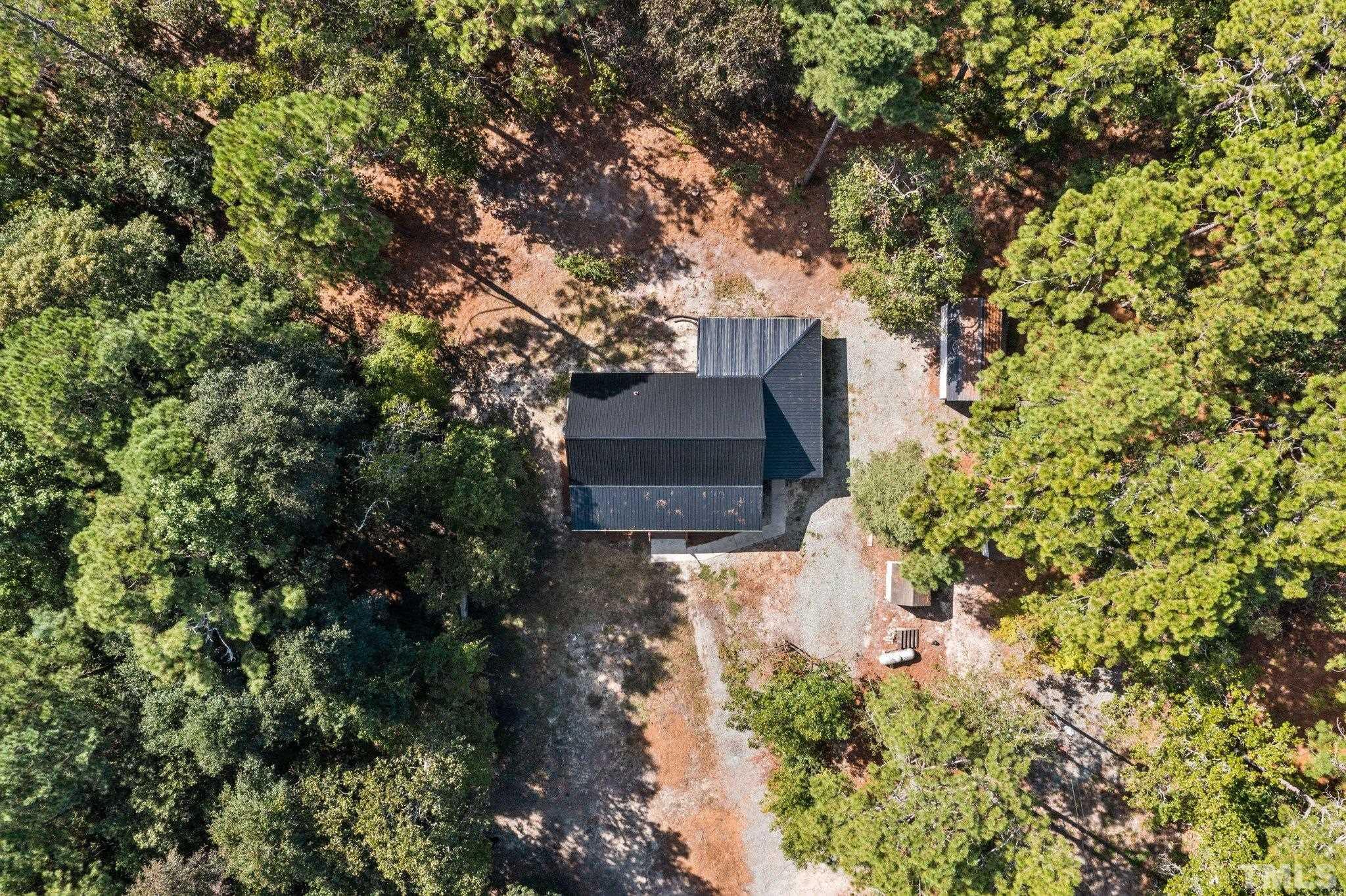 2296 Nursery Road Lillington, NC 27546 - Photo 19 of 43 an aerial view of a house with a yard