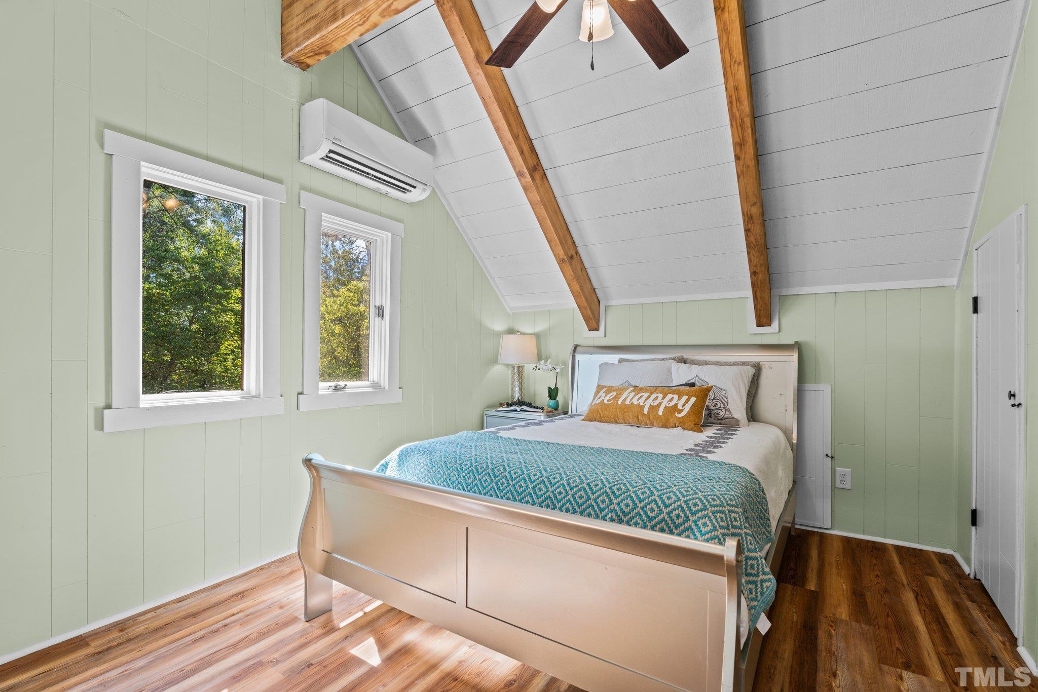 2296 Nursery Road Lillington, NC 27546 - Photo 22 of 43 a bedroom with a bed and a window