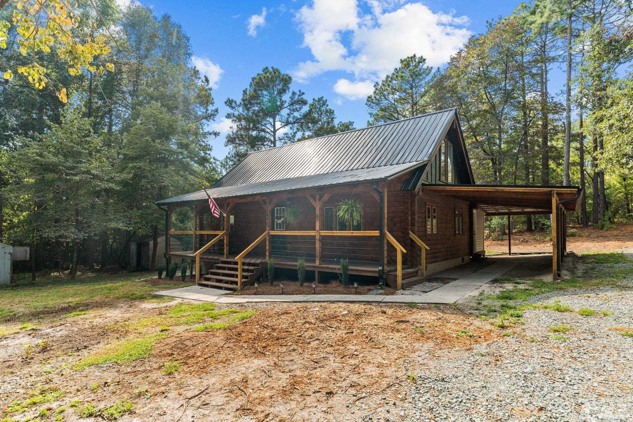 2296 Nursery Road Lillington, NC 27546 - Photo 32 of 43 a view of a house with a yard