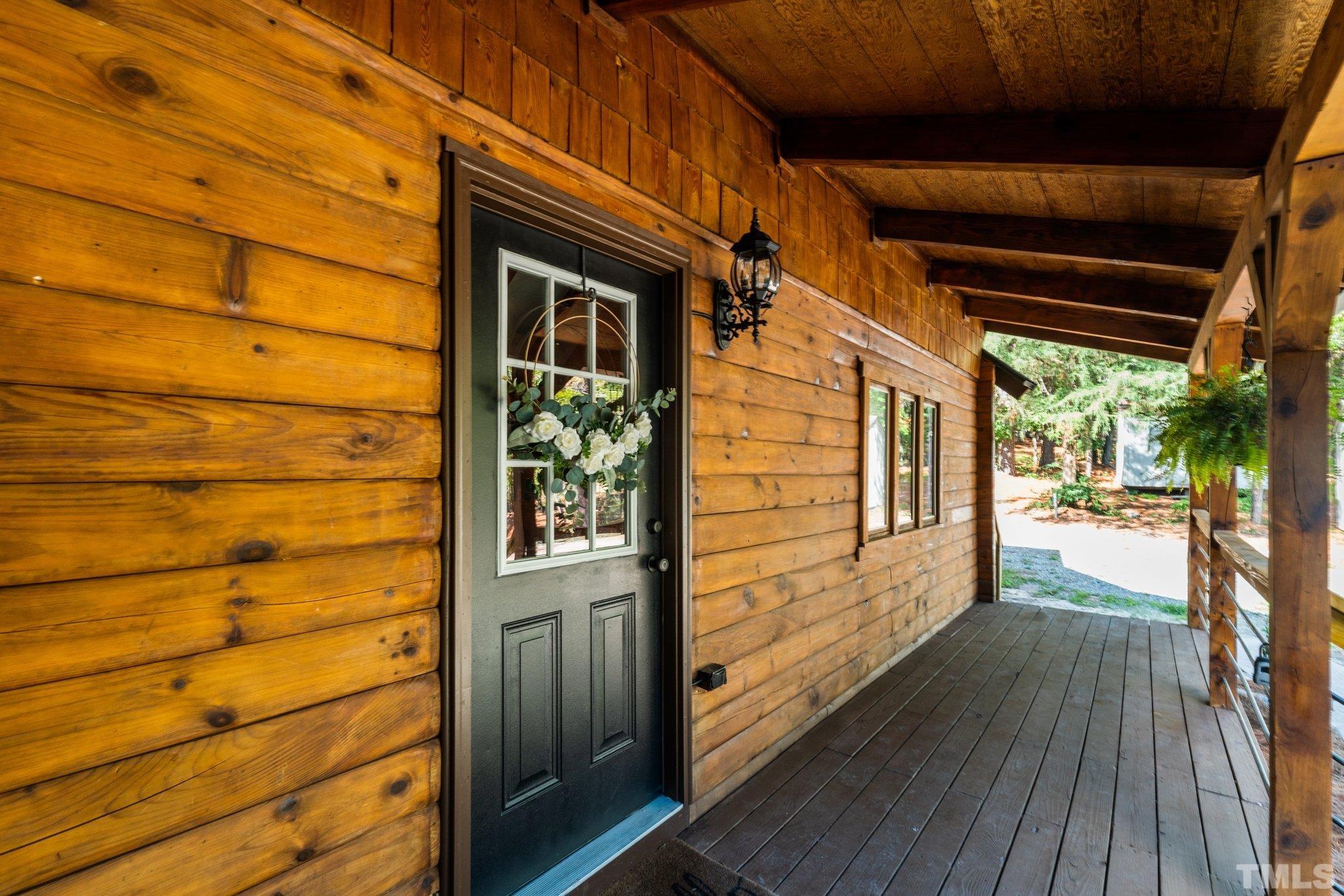 2296 Nursery Road Lillington, NC 27546 - Photo 33 of 43 a view of a door and wooden floor