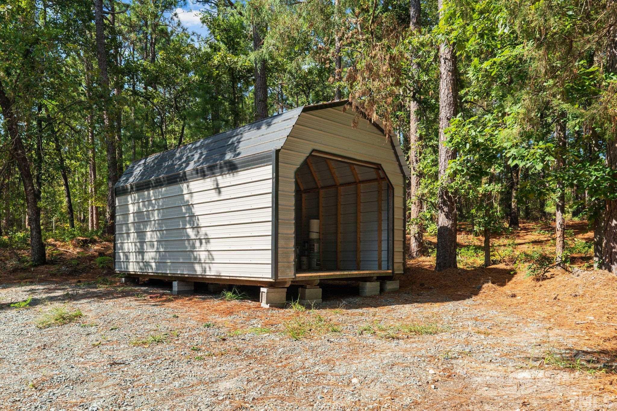 2296 Nursery Road Lillington, NC 27546 - Photo 36 of 43 a view of a house with a yard