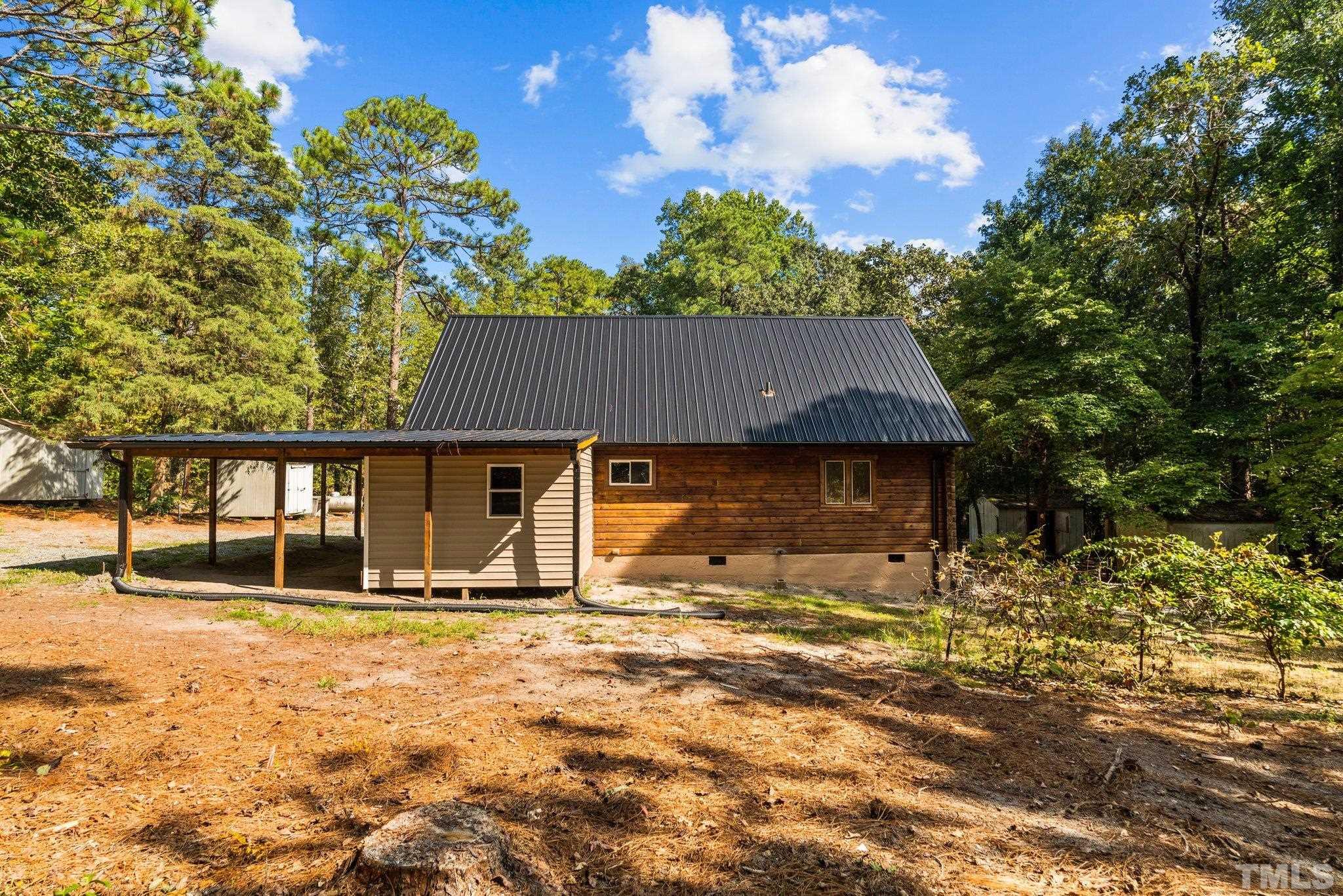 2296 Nursery Road Lillington, NC 27546 - Photo 38 of 43 a front view of a house with a yard