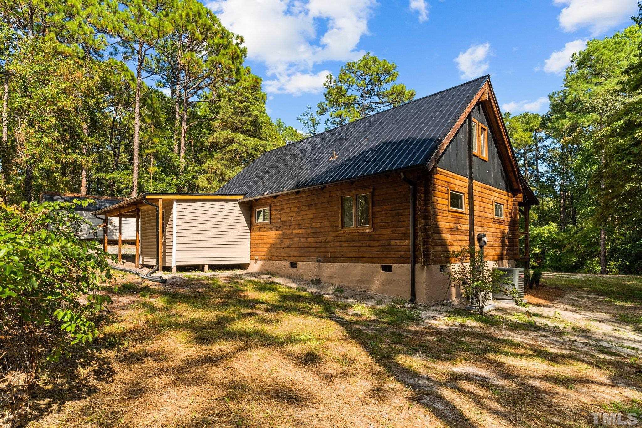 2296 Nursery Road Lillington, NC 27546 - Photo 39 of 43 a backyard of a house