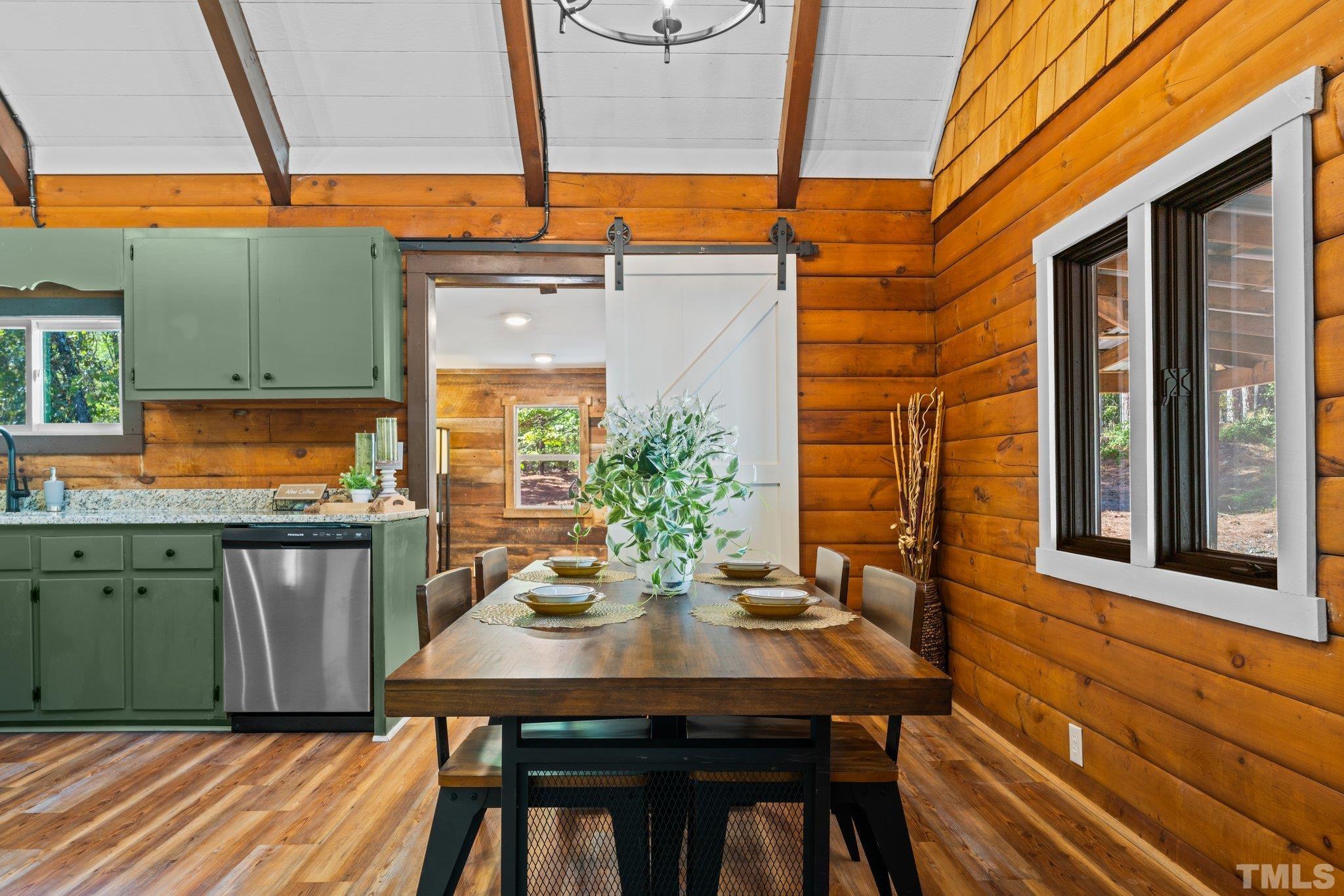 2296 Nursery Road Lillington, NC 27546 - Photo 8 of 43 a outdoor dining space with furniture and a potted plant