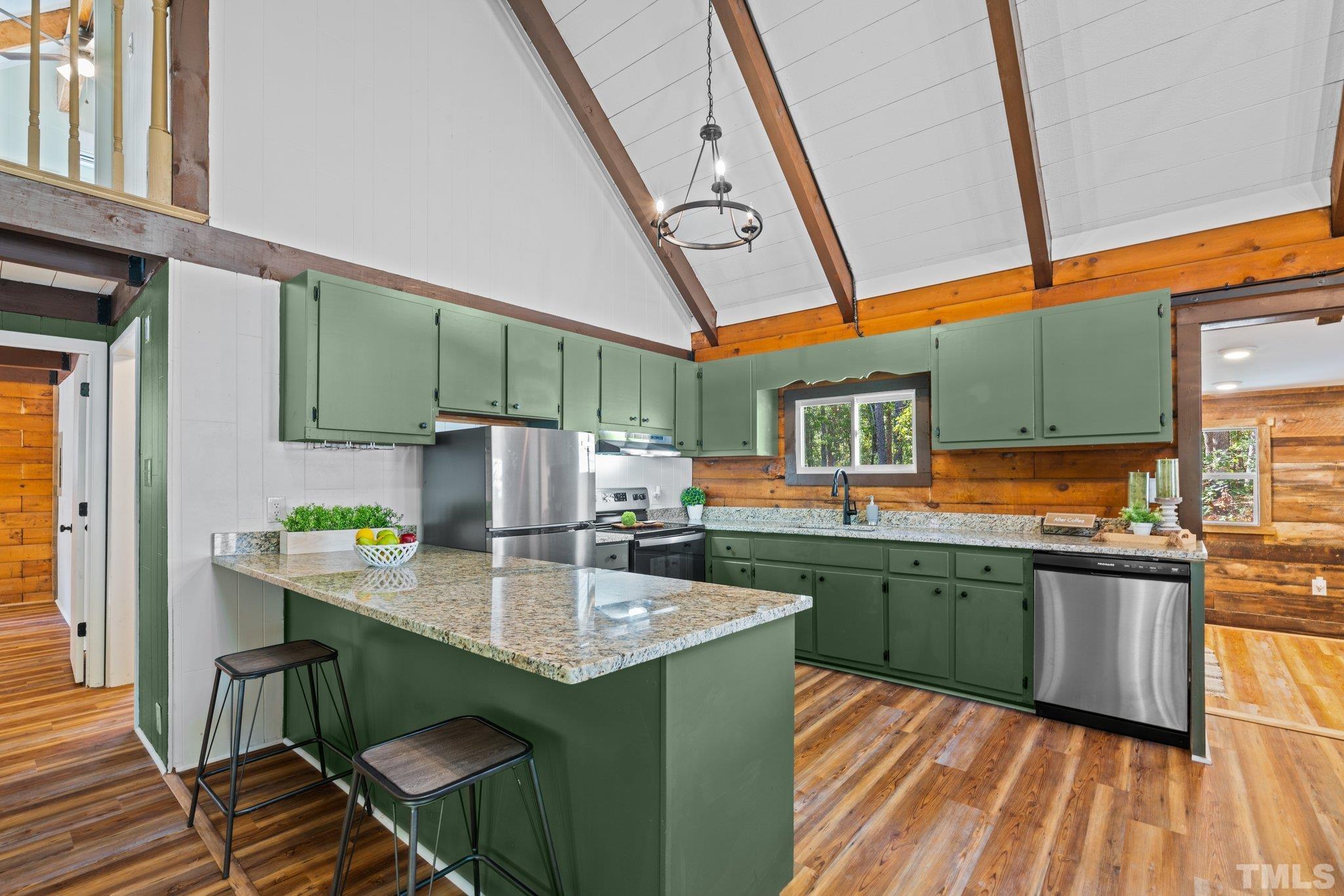 2296 Nursery Road Lillington, NC 27546 - Photo 10 of 43 a kitchen with stainless steel appliances granite countertop a sink and stove