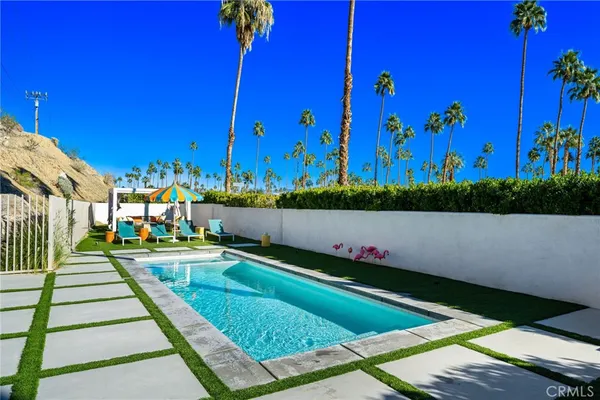 a view of a house with a swimming pool