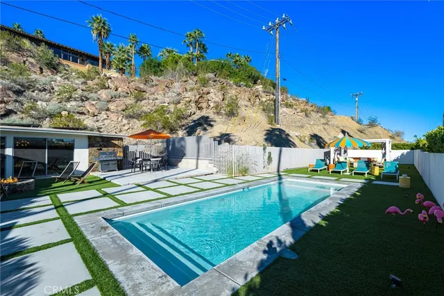 a view of a house with a swimming pool