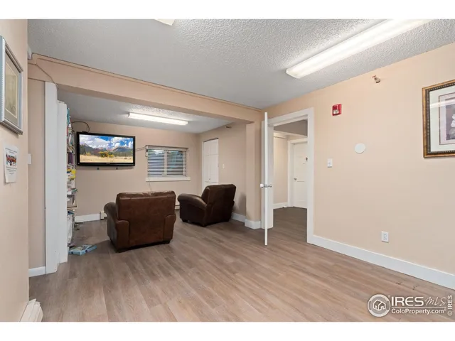 a view of livingroom with furniture and wooden floor
