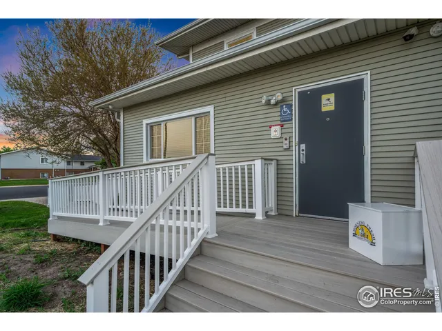 a view of balcony with wooden floor