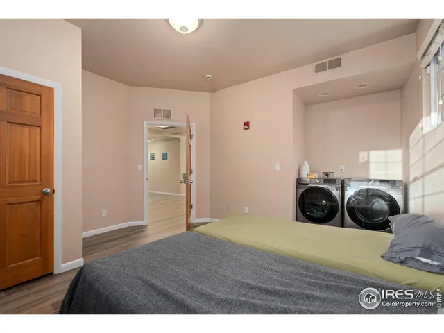 a view of a livingroom with wooden floor