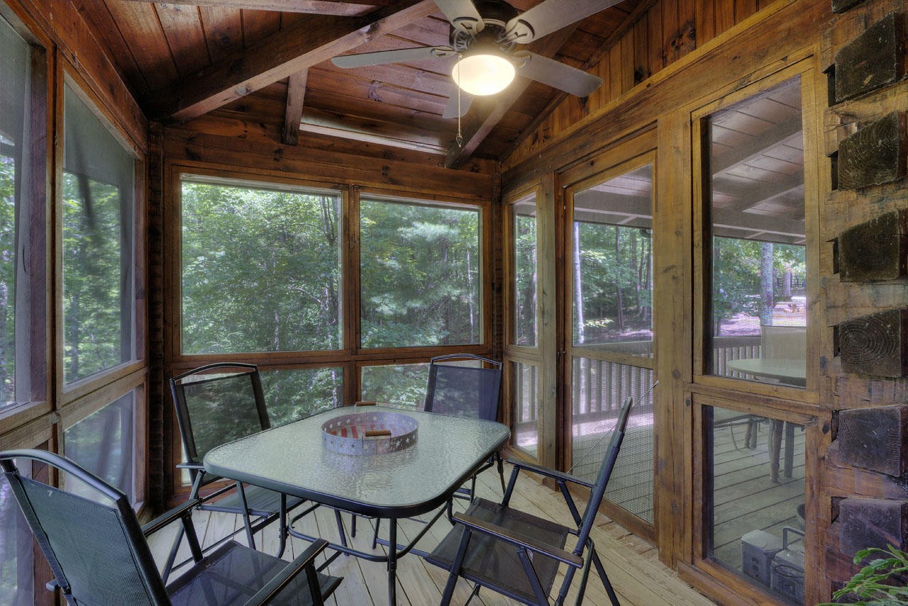 340 Doe Ridge Road Oneida, TN 37841 - Photo 24 of 40 a view of a room with furniture and wooden floor