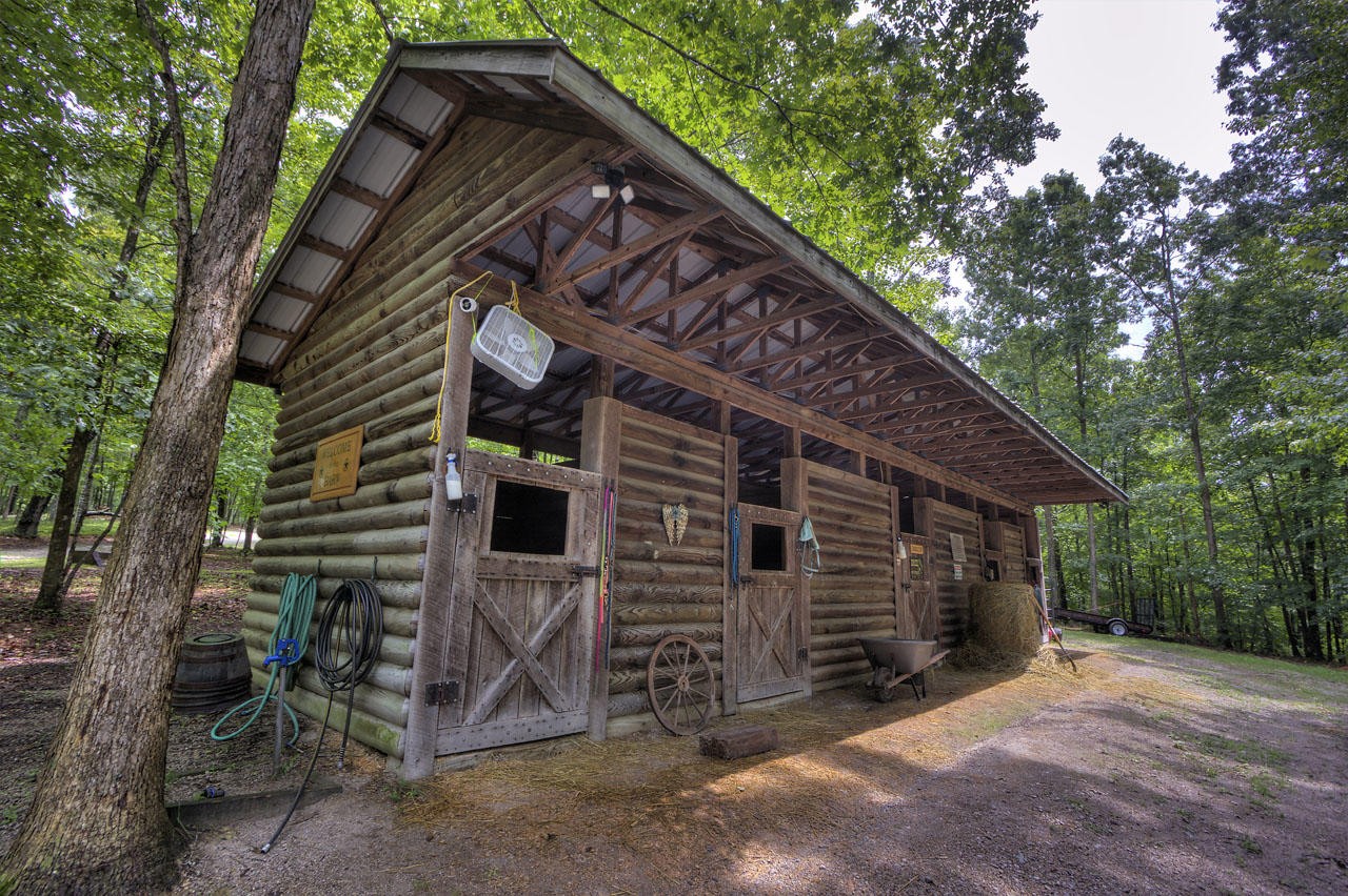 340 Doe Ridge Road Oneida, TN 37841 - Photo 36 of 40 a view of a house with a yard