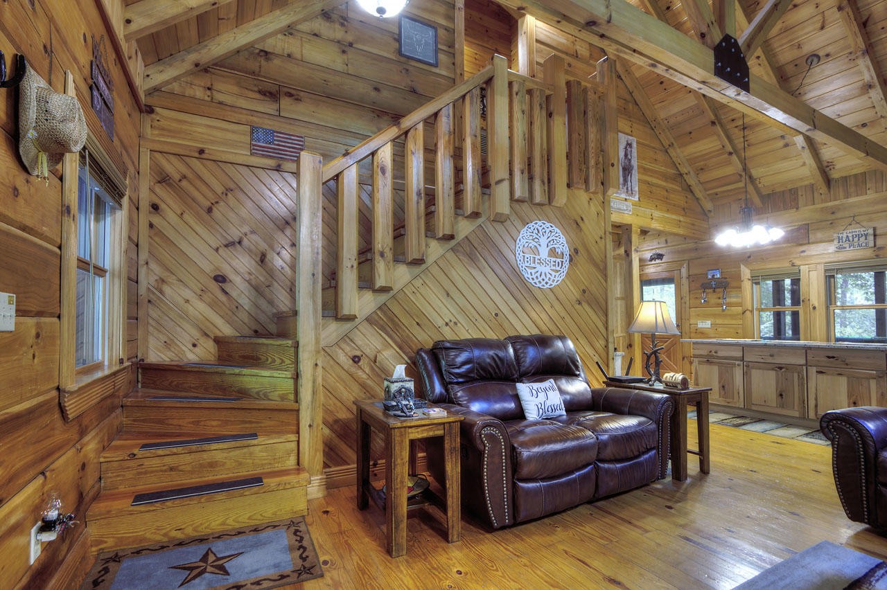 340 Doe Ridge Road Oneida, TN 37841 - Photo 5 of 40 a living room with furniture and wooden floors