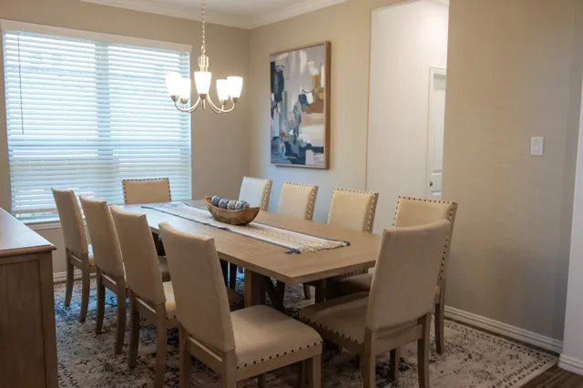 a view of a dining room with furniture
