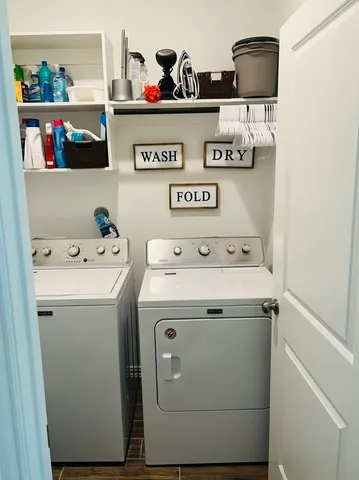 a utility room with dryer and washer