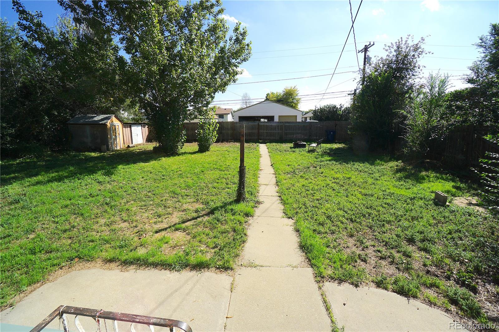 322 3rd Street Frederick, CO 80530 - Photo 6 of 30 a view of statue in the garden