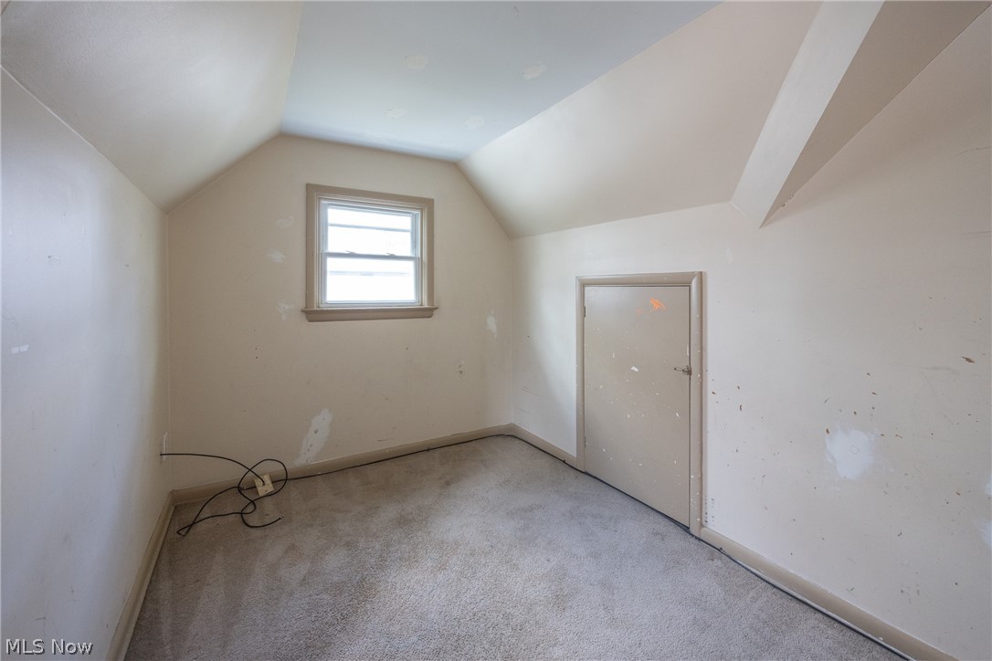 4344 West Anderson Road South Euclid, OH 44121 - Photo 13 of 14 Additional living space featuring light carpet and lofted ceiling