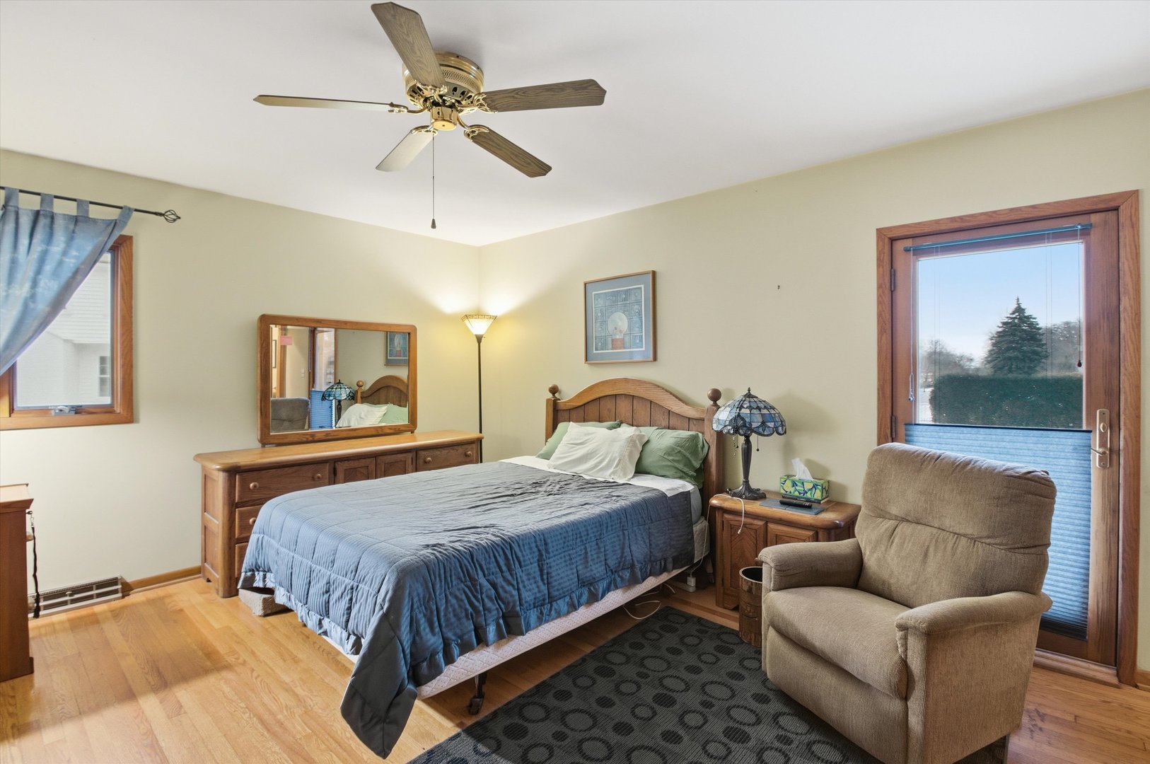 219 North Prospect Street Roselle, IL 60172 - Photo 11 of 34 a bedroom with a bed couches and window