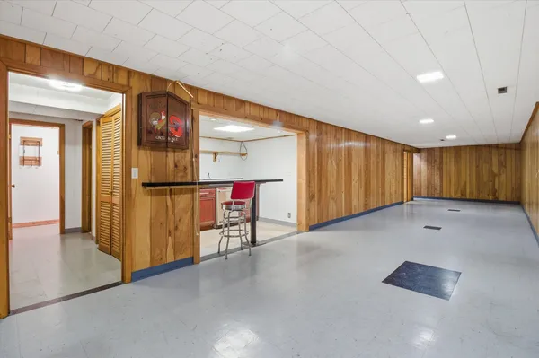 a kitchen with stainless steel appliances granite countertop a sink and cabinets