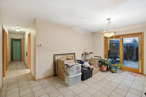 a spacious bathroom with a granite countertop sink mirror and a