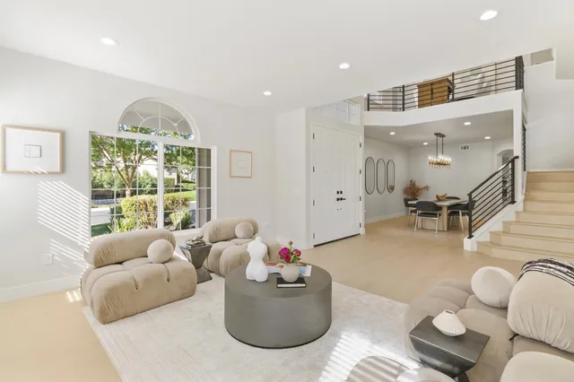 a view of a living room and dining room