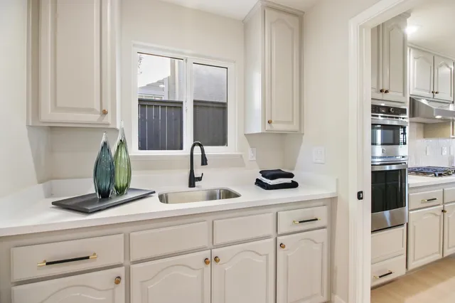 a view of a bathroom with a glass door