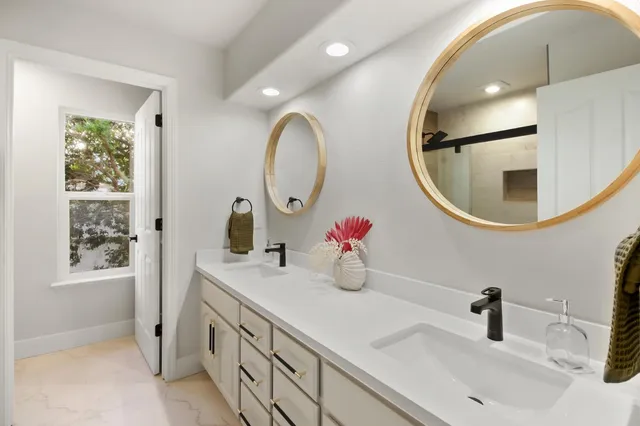 a view of backyard with front door