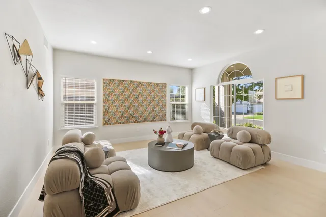 a room with furniture and a large window