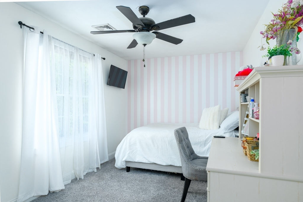 27 Vista Circle Rutland, MA 01543 - Photo 19 of 35 a workspace with furniture and a chandelier fan