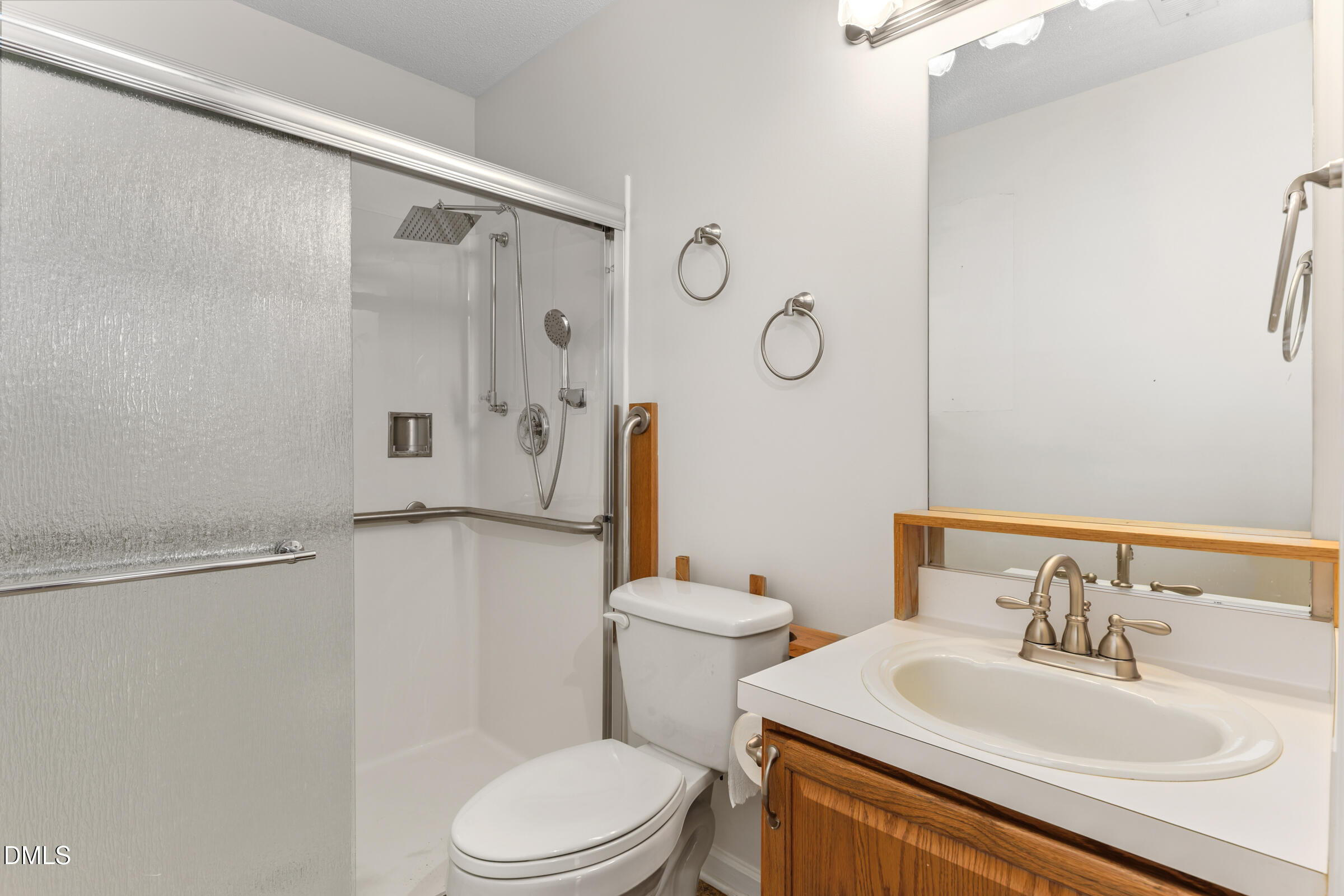 6 Tinsbury Place Durham, NC 27713 - Photo 13 of 30 a bathroom with a sink toilet and shower