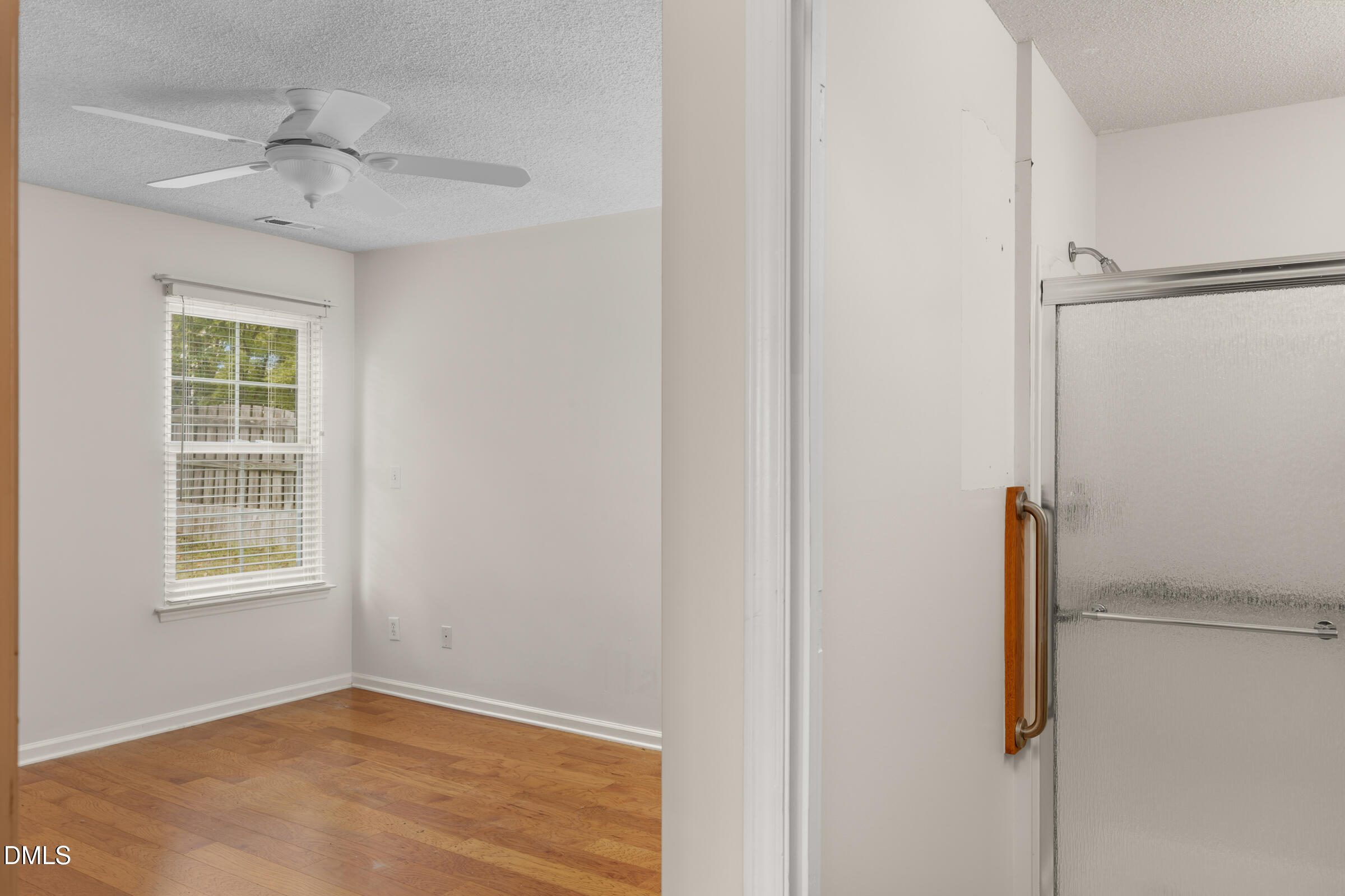 6 Tinsbury Place Durham, NC 27713 - Photo 14 of 30 an empty room with windows and closet