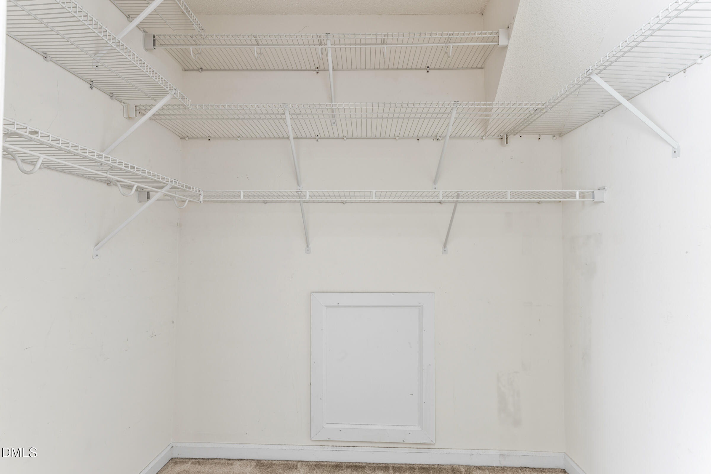 6 Tinsbury Place Durham, NC 27713 - Photo 18 of 30 a view of a rack on the wall