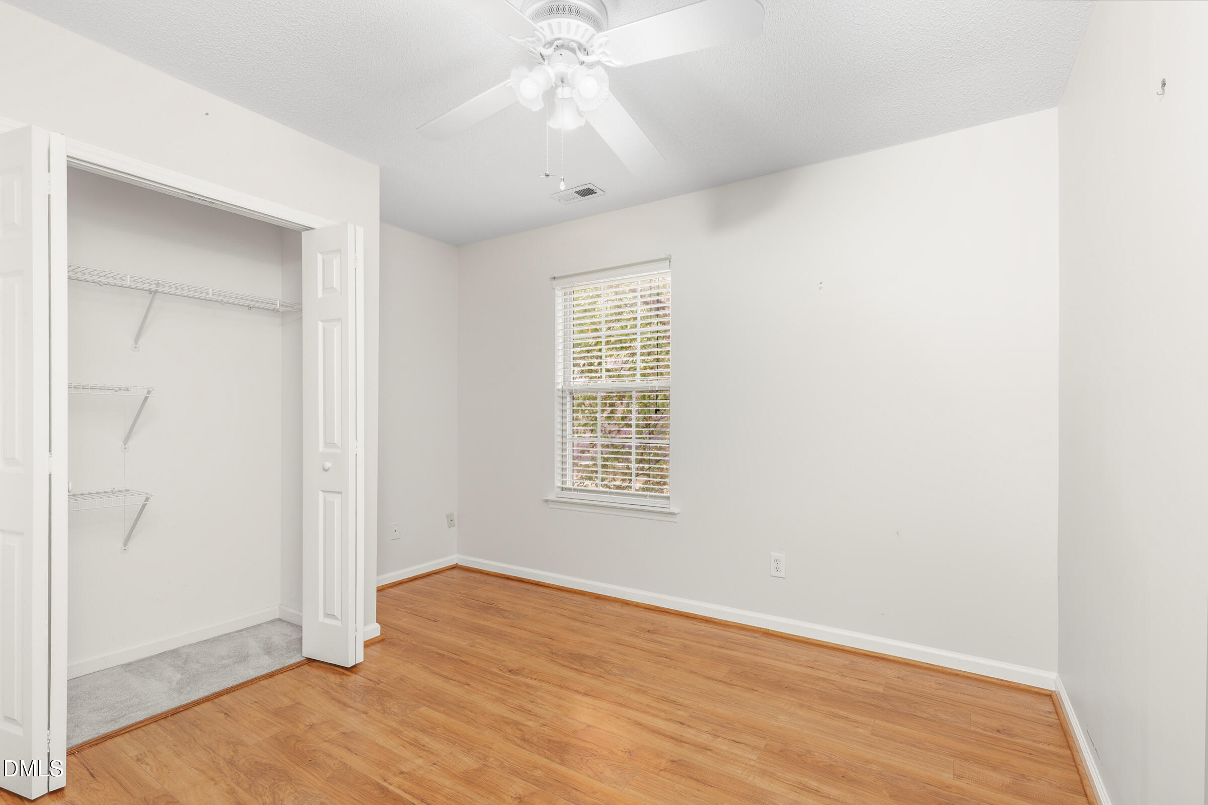 6 Tinsbury Place Durham, NC 27713 - Photo 22 of 30 an empty room with wooden floor and windows