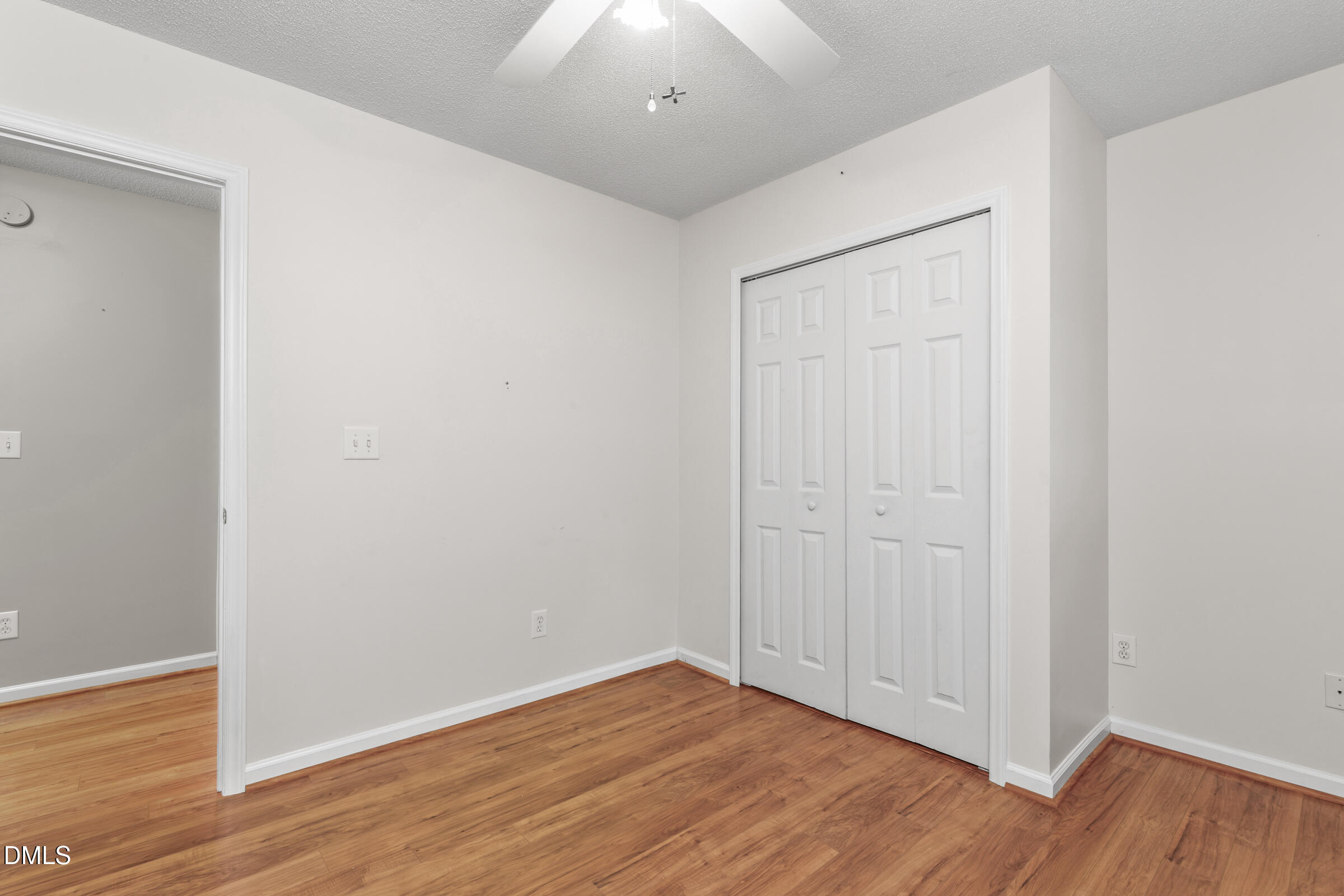 6 Tinsbury Place Durham, NC 27713 - Photo 23 of 30 a view of an empty room with wooden floor