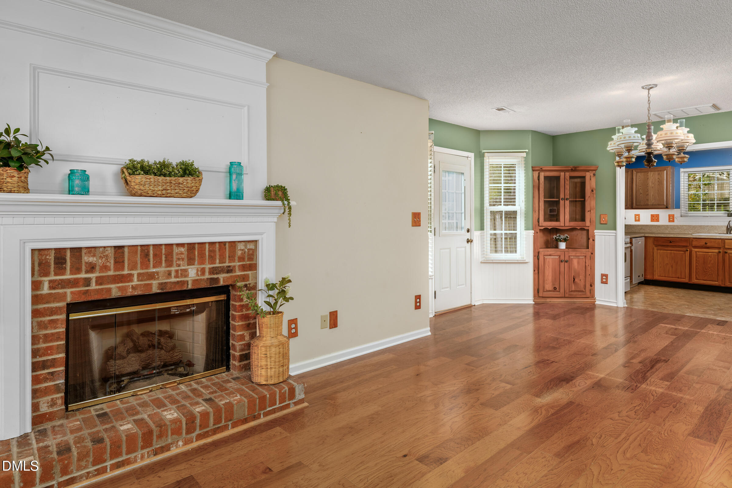 6 Tinsbury Place Durham, NC 27713 - Photo 4 of 30 a living room with furniture and a fireplace